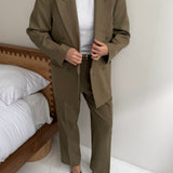Pale green double breasted suit