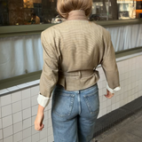 Belted blazer in warm tones