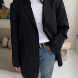 Black pinstriped Dior blazer