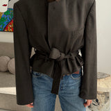 Belted blazer in dark olive green checkered