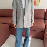 Button back blazer in light grey plaid