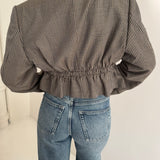 Cropped blazer with cinched waist in houndstooth