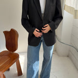 Button back blazer in Black pinstriped