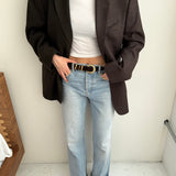 Contrasted blazer in green and brown tones