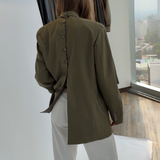 Green double breasted button back blazer in green