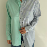 Contrasted shirt in green tones
