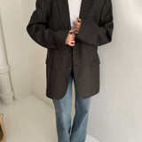 Dark green and grey speckered houndstooth blazer