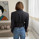Cinched waist cropped blazer in dark grey pinstriped