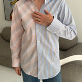 Light blue striped and white with orange/pink stripes contrasted shirt