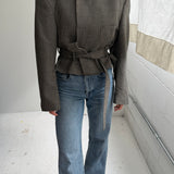 Belted blazer in houndstooth green toned