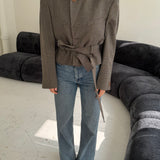 Belted blazer in speckered tones