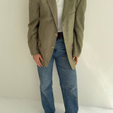 Green houndstooth and solid blazer