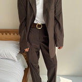 Brown suit with subtle stripes