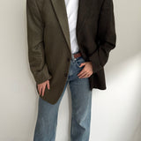 Contrasted blazer in green and brown tones