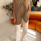 Stunning button back vest in Taupe/beige
