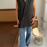Double-breasted button back vest in green houndstooth