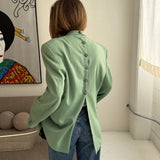 Button back blazer in pale green