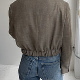 Bomber in pale sand