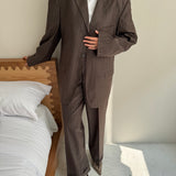 Brown suit with subtle stripes