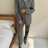 Pale grey pinstriped suit