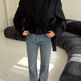 Pinstriped black and navy belted blazer