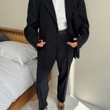 Navy pinstriped suit