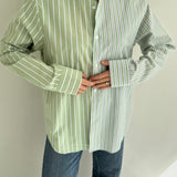 Contrasted shirt in green tones