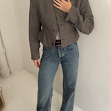 Cropped blazer with cinched waist in houndstooth