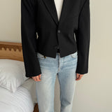 Cropped blazer with cinched waist in black