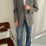 Contrasted blazer in checkered tones