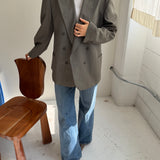 Pale green double-breasted button back blazer