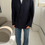 Double-breasted navy pinstriped button back blazer