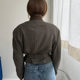 Belted blazer in houndstooth green toned