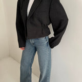 Dark toned cinched cropped blazer