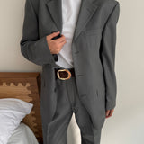 Pale grey pinstriped suit