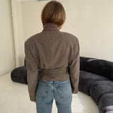Belted blazer in speckered tones