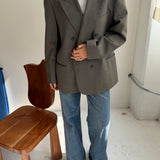 Pale green double-breasted button back blazer