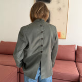 Green double-breasted button back blazer