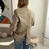 Double-breasted speckered beige button back blazer