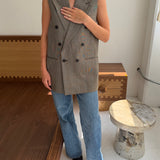 Stunning button back vest in plaid
