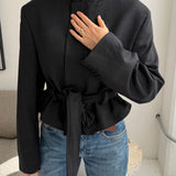 Belted blazer in black checkered