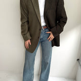 Contrasted blazer in green and brown tones
