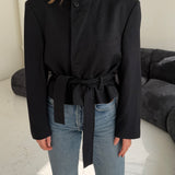 Pinstriped black and navy belted blazer
