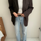 Contrasted blazer in green and brown tones