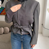 Speckered grey belted cropped blazer