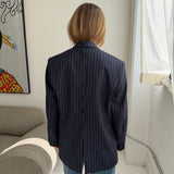 Double-breasted navy pinstriped button back blazer