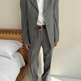 Pale grey pinstriped suit