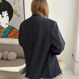 Double-breasted navy button back blazer