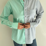Contrasted shirt in green tones
