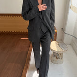 Grey pinstriped suit with vest